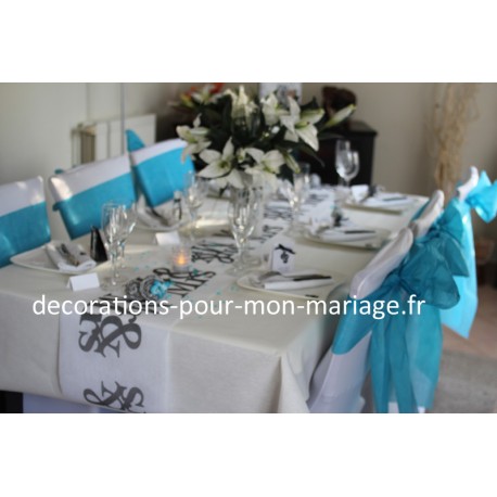 decorations housses de chaise et noeuds turquoises